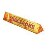 name} Шоколади Toblerone Швейцарски шоколад с мед и бадемова нуга, комбиниран с добавка на портокалови кори, покрити с джинджифил 360 гр