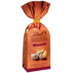 name} Млечен Lindt Печени ядки от кашу в млечен шоколад (70%) с нотка канела и кориандър 100 гр