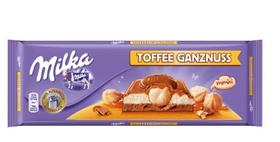 Milka Алпийски млечен шоколад с карамелен пълнеж и цели лешници 300 гр